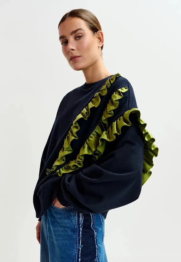 BLUZA Z ASYMETRYCZNĄ FALBANĄ GRANATOWA