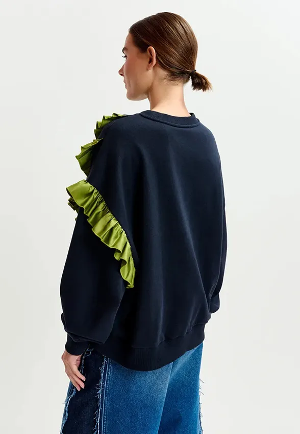 BLUZA Z ASYMETRYCZNĄ FALBANĄ GRANATOWA