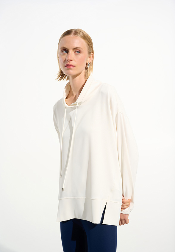BLUZA Z ROZCIĘCIAMI KREMOWA