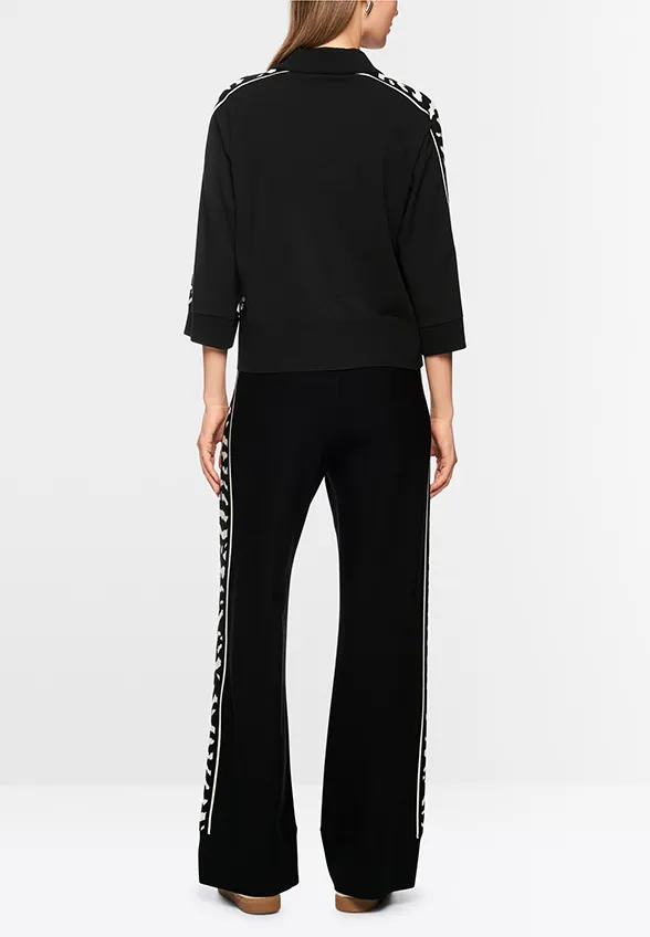 SWETER O LUŹNYM KROJU CZARNY