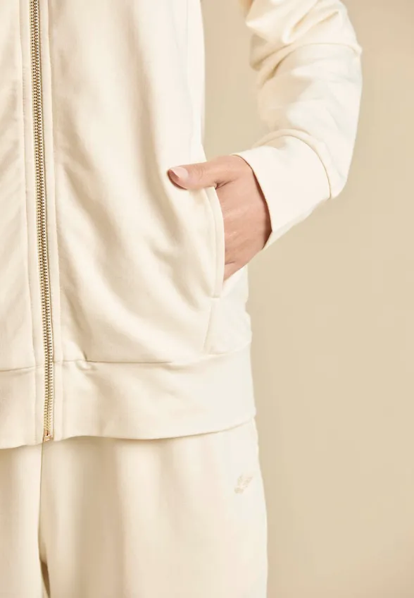 BLUZA Z MODALU KREMOWA